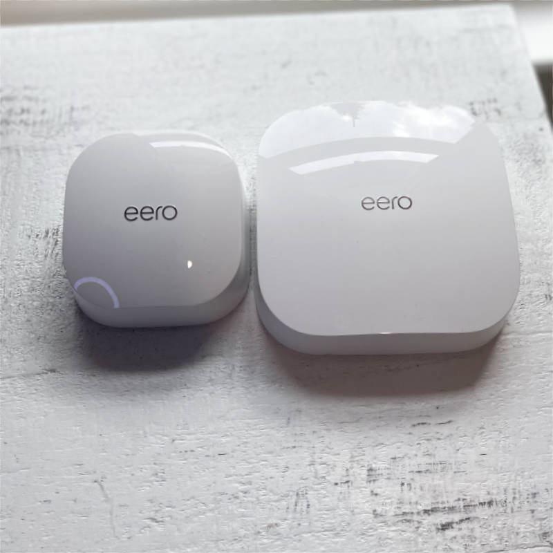 eero 6 next to eero Pro 6 on desk top view