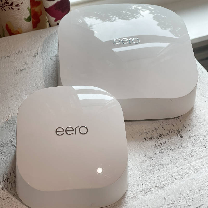 eero 6 vs eero pro 6 on desk by window