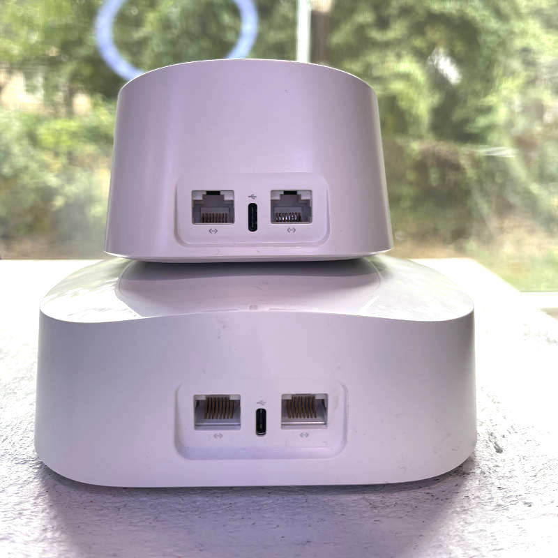 eero 6 vs eero pro 6 routers stacked back side