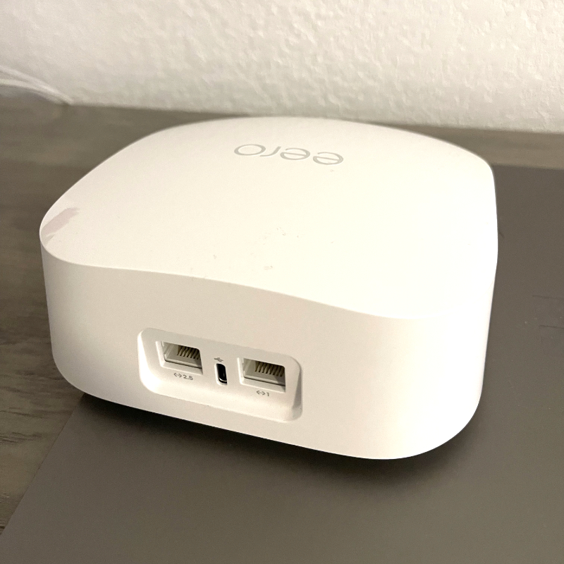 eero Pro 6E on corner table